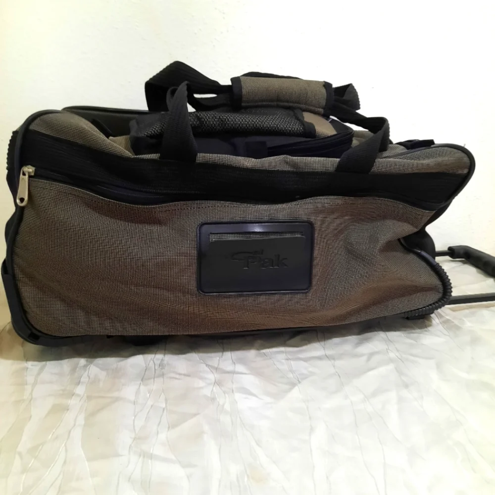 Calpak rolling duffel bag